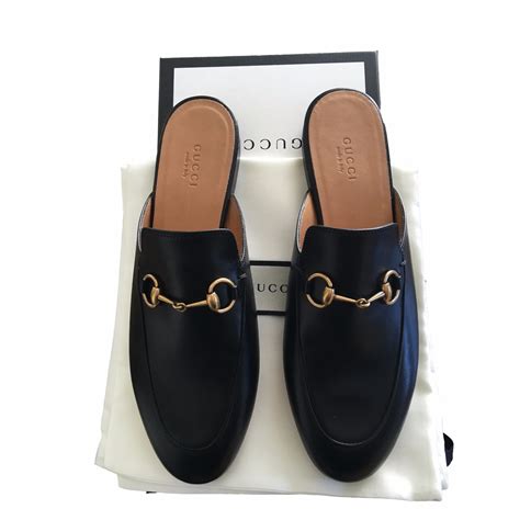 gucci buckle strap leather mules|princetown gucci mules.